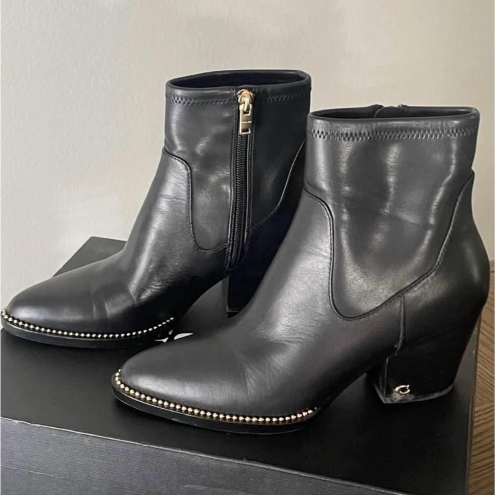 Coach Black Leather Ankle Boots with Gold Accents